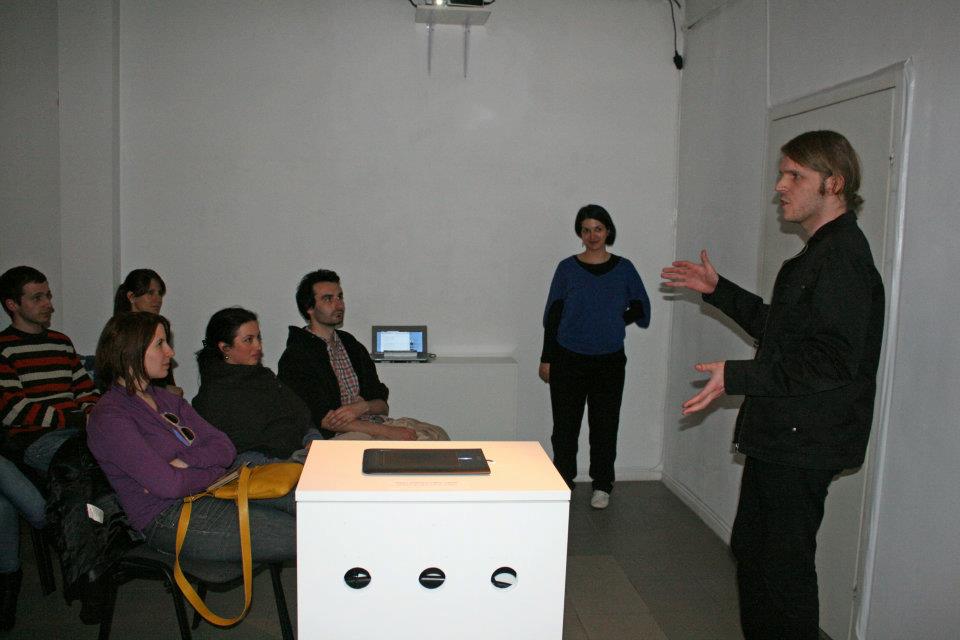 Rob Fischer aka Hexler (right) and Yana Krachunova (second from the right) talk about the Like Bomb project.